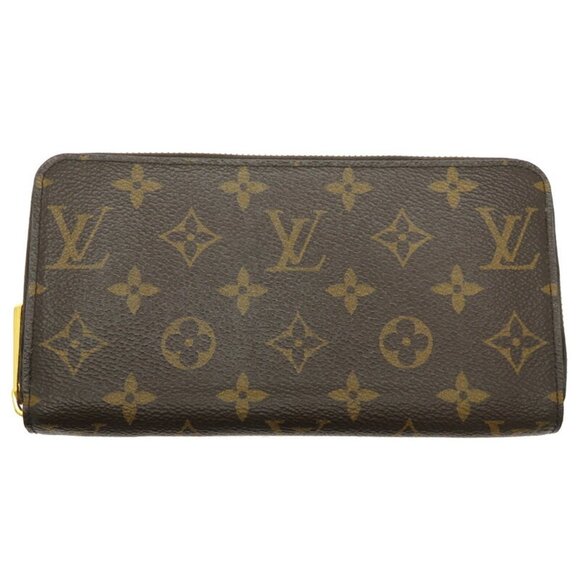 LOUIS VUITTON Brown Monogram Wallet - Picture 1 of 10